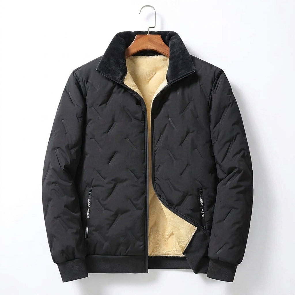 A black quilted puffer jacket with a beige fleece lining, hanging on a wooden hanger against a plain white background.