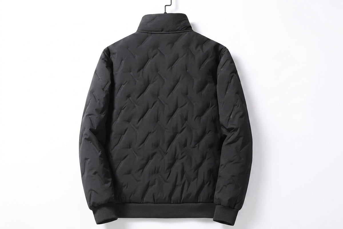 A black quilted puffer jacket with a stand-up collar, shown from the back on a hanger against a plain white background.