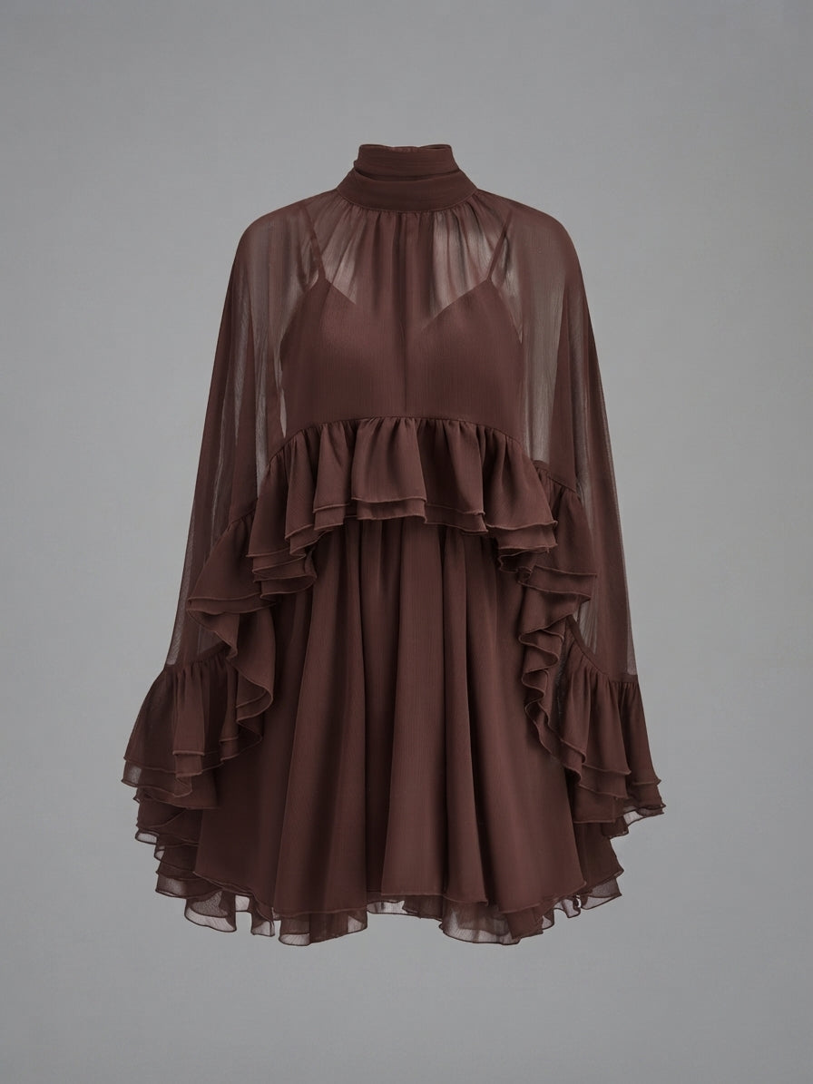 A brown sheer mesh long-sleeve dress with a high mock neck, layered ruffle details, and a flared skirt, shown against a solid gray background.