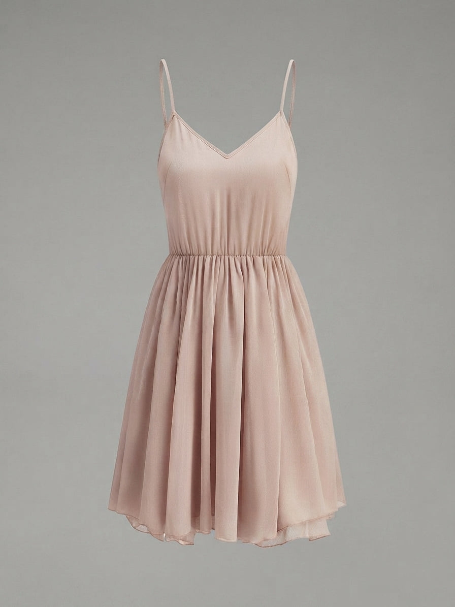A light pink spaghetti-strap mini dress with a V-neckline and a flared skirt, shown against a solid gray background.