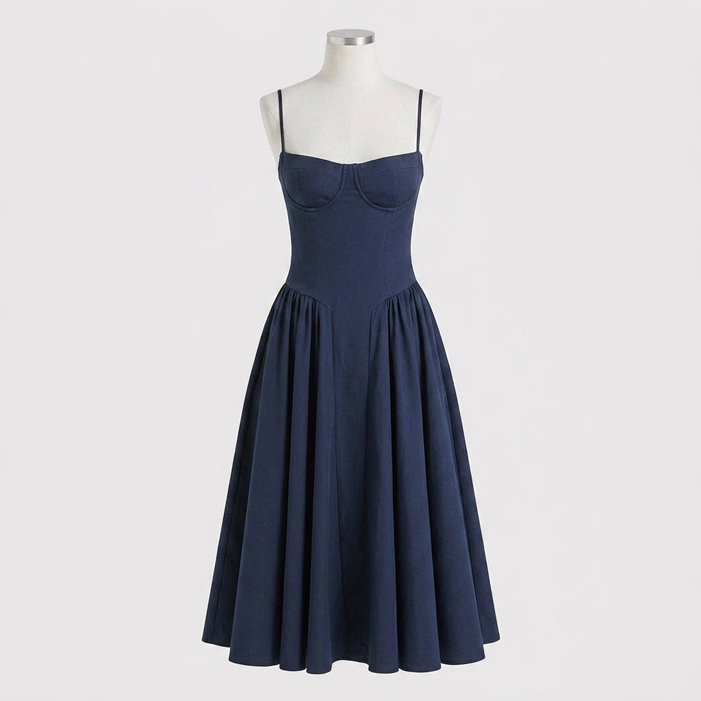 a thin strapped, blue midi dress on a mannequin 