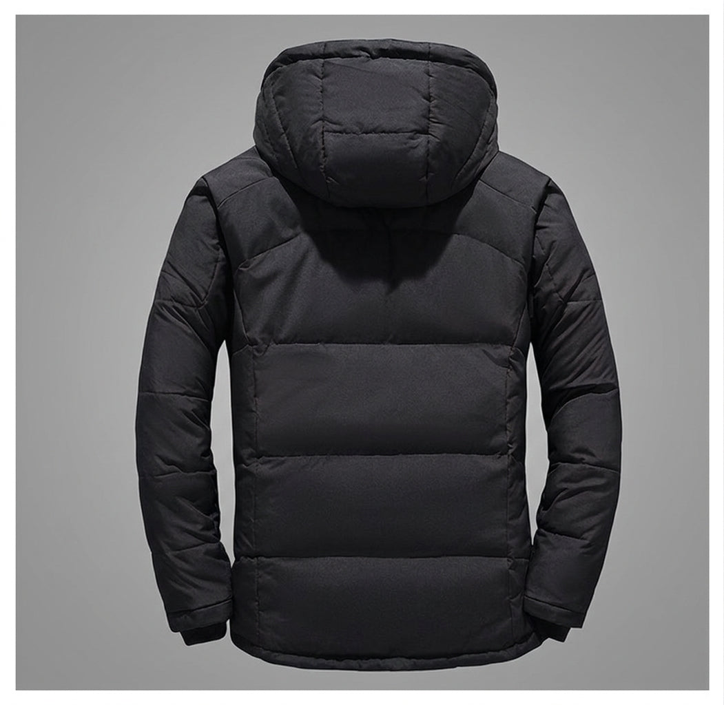 A black hooded puffer jacket shown from the back, photographed against a solid gray background.