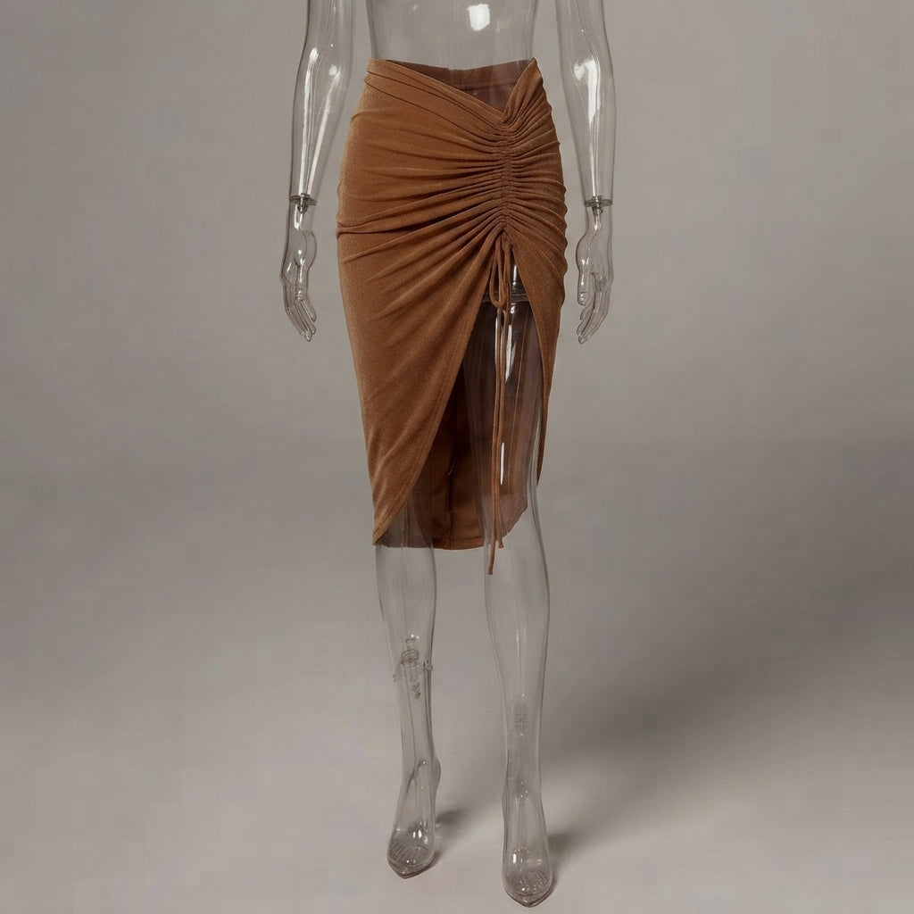 A ruched brown wrap skirt displayed on a clear mannequin against a neutral gray studio background.