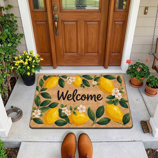 Doormat with lemon design and 'Welcome' text on a front porch with shoes and plants.