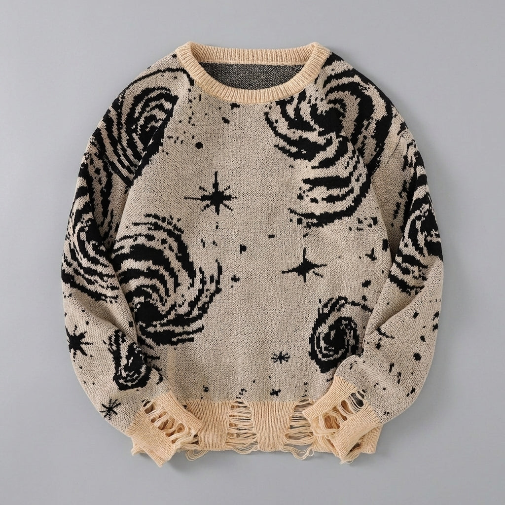 Beige sweater with black abstract patterns on a gray background