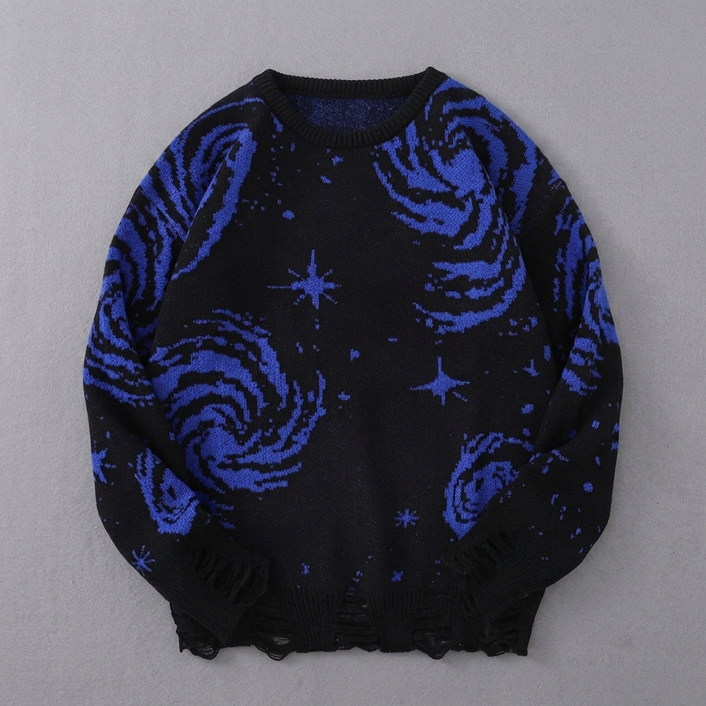 Black sweater with blue abstract patterns on a gray background